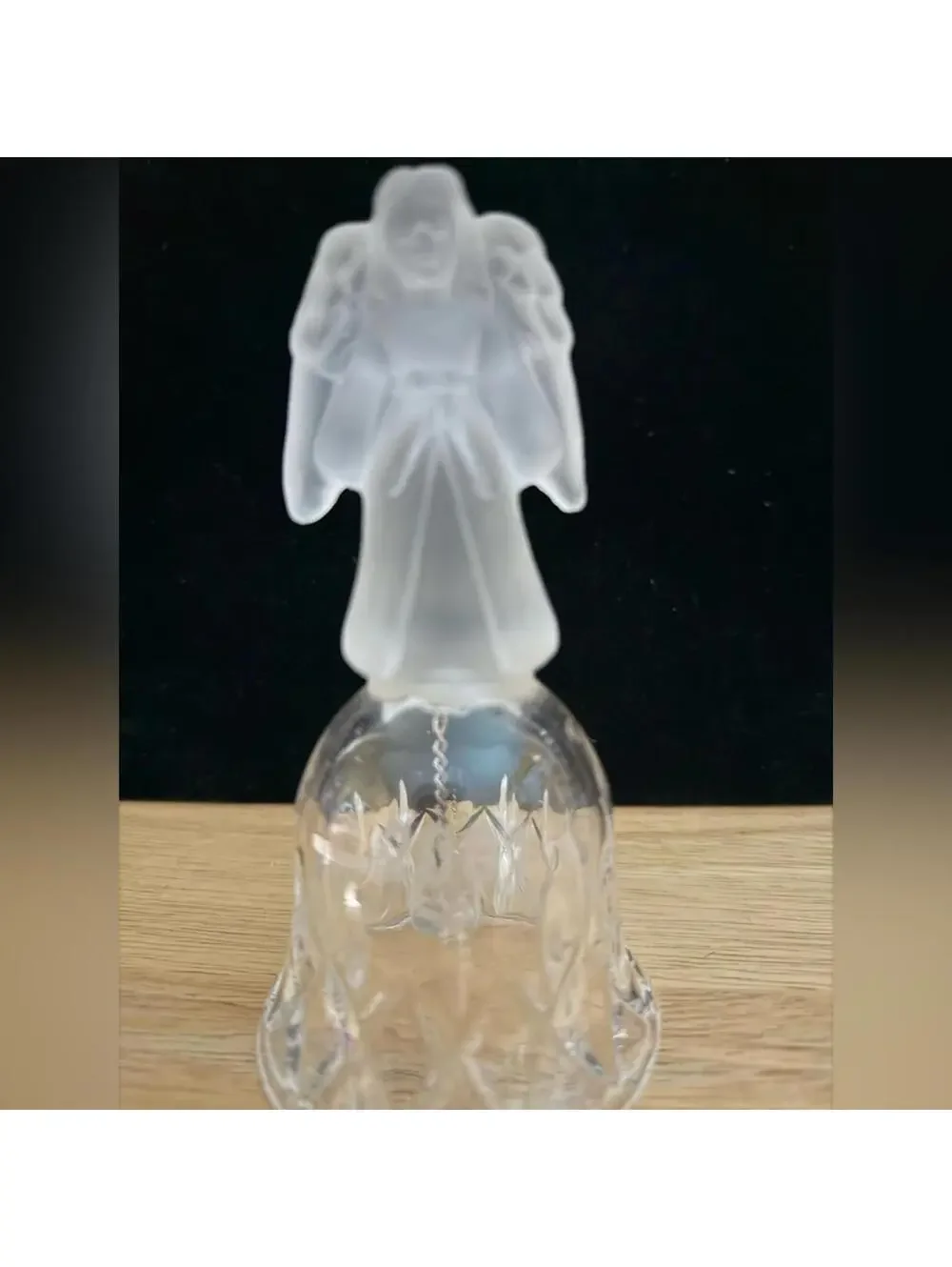 vintage frosted angel sits atop a crystal bell etched with the year 2001.